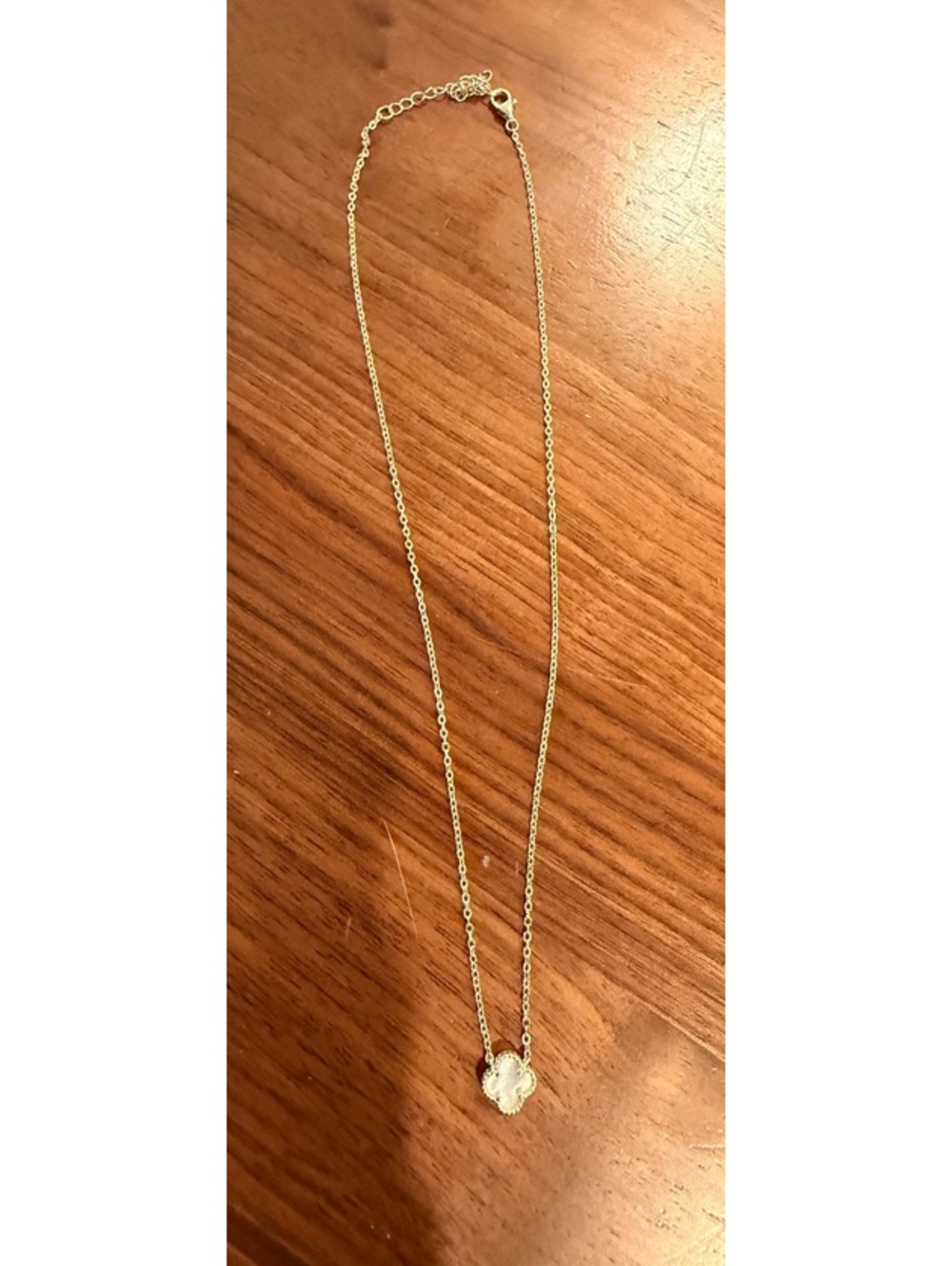 Gold Tone Necklace with Clover-Shaped Pendant